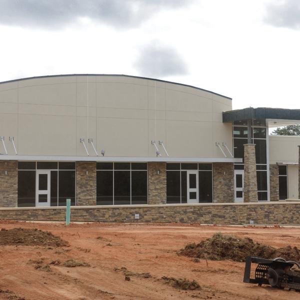 All that's missing is landscaping and a big Gatewood "G" logo on the front of Gatewood's new $8.3 million high school building in Eatonton. Gatewood staff and students are eager to make the new building come to life next month. (IAN TOCHER/Staff)