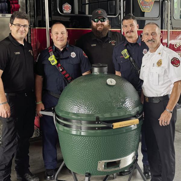 Chief Rodney Wiggins of Greene County Fire and Rescue sends a big thank you to Donna and Paul Hyland and the Boys and Girls Club of Green County as he accepts the raffle prize from this past weekend‘s BBQ Fest held at the Farm at Oconee. CONTRIBUTED