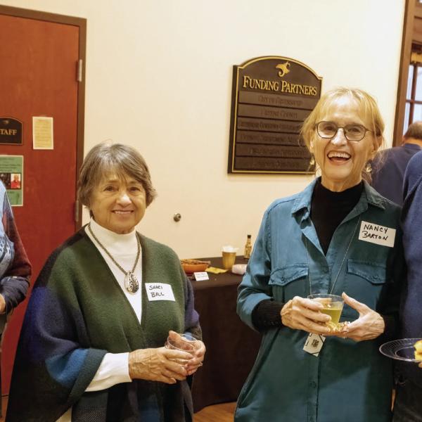 Liz Kippels and Shari Ball meet up with Nancy and Jim Barton at the artist reception last Wednesday evening. LEIGH LOFGREN/Staff