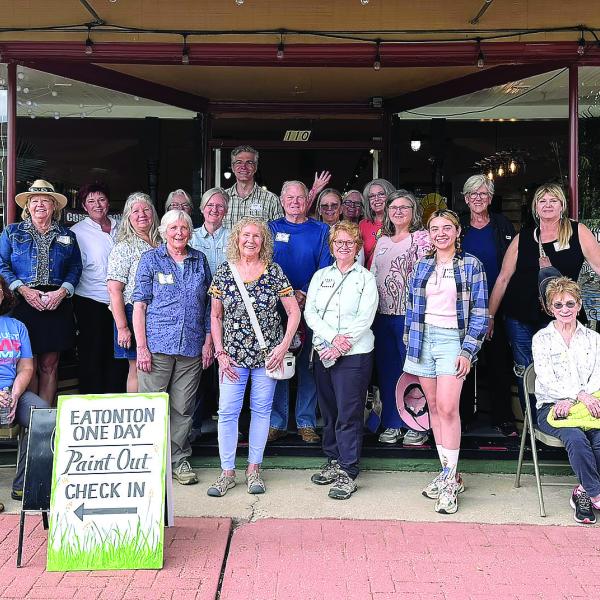 Attendees of the 8th annual Paint Out pose in front of the Artisan Village Guild. (CONTRIBUTED)