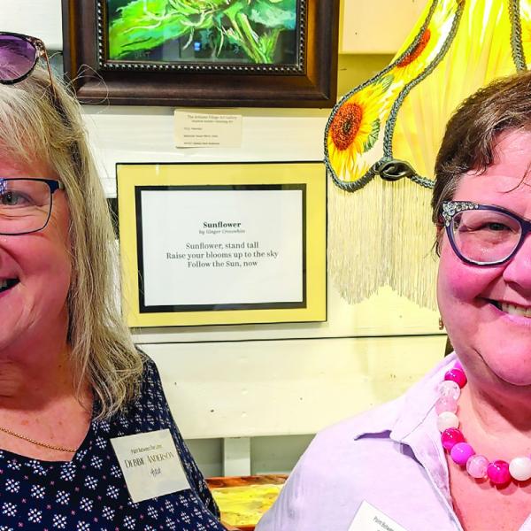Artist Debbie Anderson (left) submitted her artwork “Potential,” inspired by author Ginger Crosswhite’s “Sunflower,” a haiku style poem. CONTRIBUTED