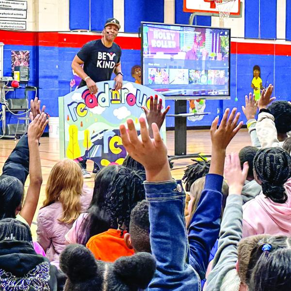 Stanley Tucker selects two contestants from the crowd. COURTESY OF PCES
