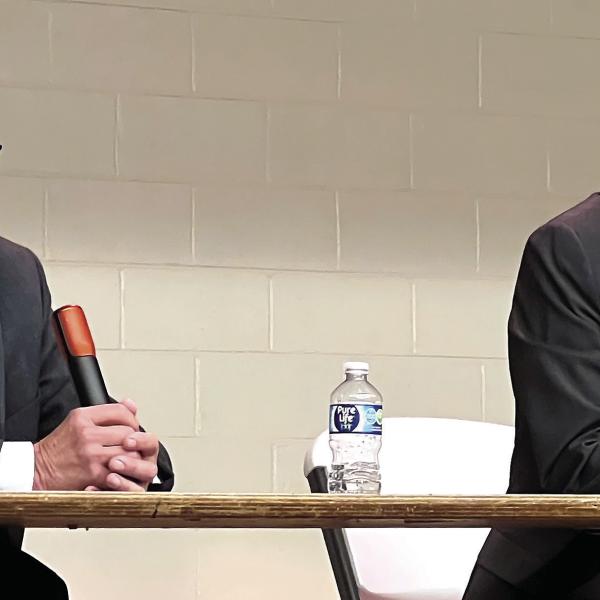 Putnam County District 2 Commissioner Daniel Brown (left) and challenger Richard Garrett spoke before interested voters last Thursday at the Butler-Baker school in Eatonton. A follow-up faceoff is scheduled for 6:30 p.m. this Thursday at The Plaza Arts Center. IAN TOCHER/Staff