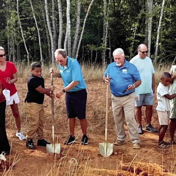 Members of three local families joined Greene County Habitat for Humanity representatives in a recent groundbreaking ceremony for their new homes to bes funded through last month’s Lake Oconee Showcase of Homes. CONTRIBUTED