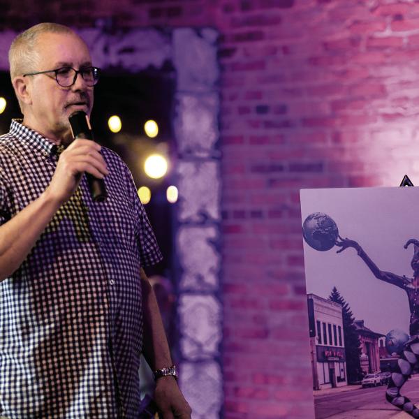 In a presentation at Barrel 118 on Friday night, Kevin Tomson-Hooper introduced four new artworks to the Eatonton Sculpture Trail, including “Delicate Balance,” which has been installed outside The Artisans Village Gallery on West Marion Street. IAN TOCHER/Staff