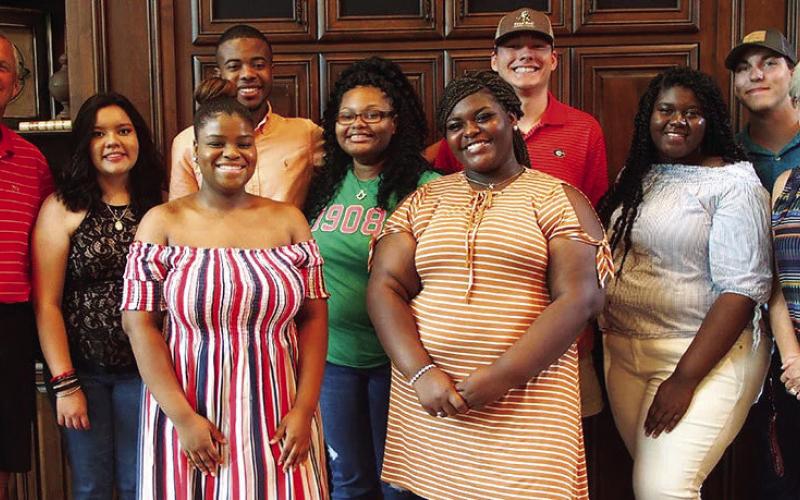 Greg and Anna Lawton with ATLAS scholarship recipients, honoring Greg’s legacy of mentorship, faith, and investment in Greene County students. CONTRIBUTED