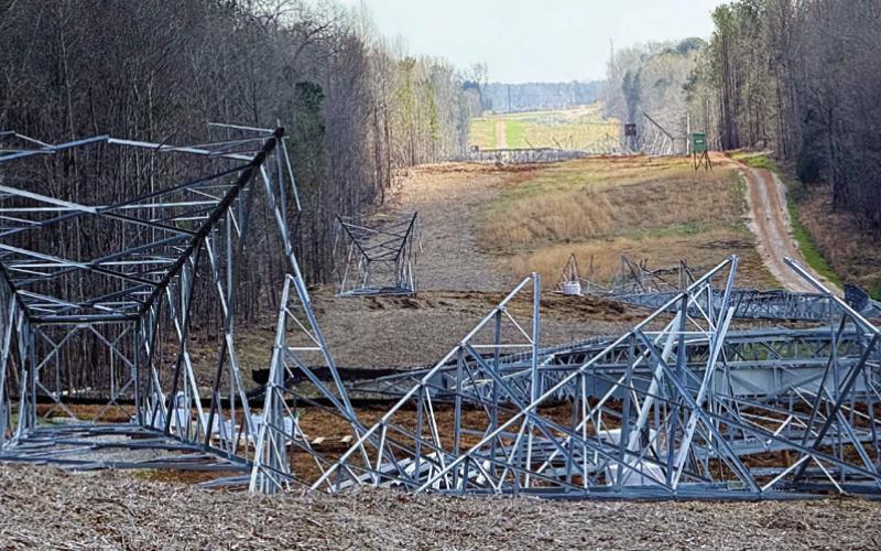 Within Putnam County, the Georgia Transmission project will include a series of large, lattice-style, steel structures, each standing between 100 and 150 feet tall and spaced about 1,200 feet apart. IAN TOCHER/Staff