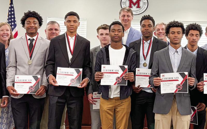 Morgan County’s varsity basketball team were honored with certificates at the April 13 BOE meeting. The Dogs won the 2026 GHSA AA basketball state championship in overtime a month prior..
