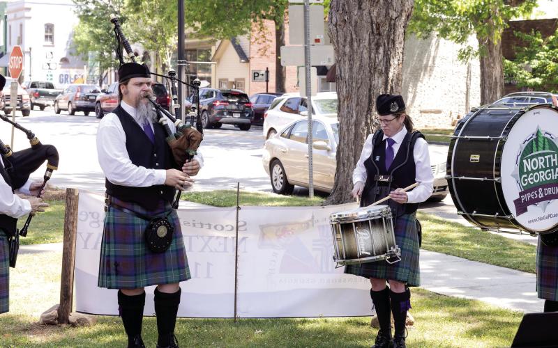 Bagpipers and drummers play outside as attendees arrive to First Presbyterian Church in Greensboro for Scottish Heritage Day. LEIGH LOFGREN/Staff