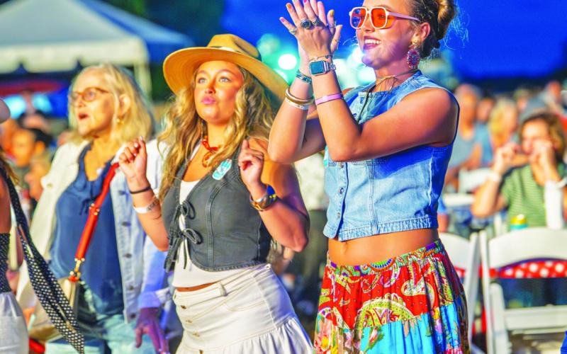 Music fans were frequently brought to their feet during the OPAS concert at The Farm at Oconee, whether dancing the night away or simply to provide a standing ovation for the performers onstage.
