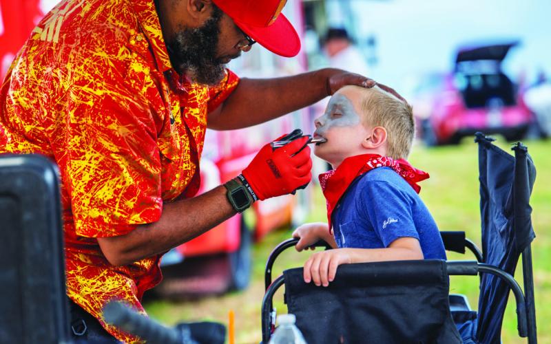 Younger music fans had plenty to see and do as well, including getting their faces painted for the OPAS occasion.