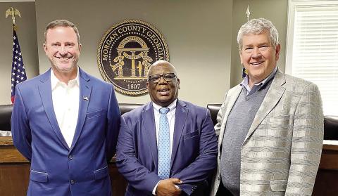 New District 1 Commissioner Carl Jones (center) and new District 5 Commissioner Nathan Park (left) were sworn in by Probate Judge Charles W. Merritt Jr. on March 27. Jones and Park served their first county commission meeting on April 1. CONTRIBUTED