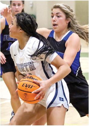 The Lady Titans have a starting five full of scorers and is currently averaging about 57 points per game. LANCE McCURLEY/Staff
