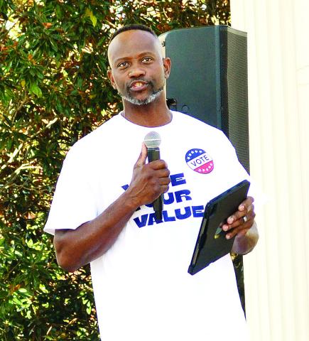 Pastor Derrick Worrell of First St. Paul Baptist Church centered his remarks around gun safety and responsibility. T. MICHAEL STONE/Staff