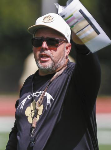 Chris MacFarland, Greene County’s third head coach in as many years, intends to bring back stability to its football program. LANCE McCURLEY/Staff