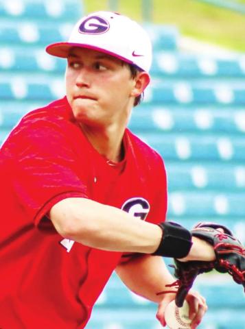 Georgia freshman pitcher Chandler Marsh (27) gets set to deliver a pitch against Alabama in the first round of the SEC Tournament at the Hoover Met. LANCE McCURLEY/Staff