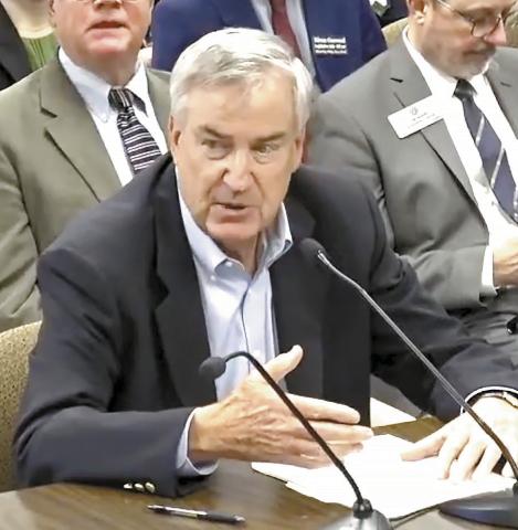 Michael Hartman speaks to members of the Energy, Utilities and Telecommunications Commission, a committee of the Georgia House of Representatives, about high bills and customer service issues with privately owned Piedmont Water Company. SCREENSHOT VIA YOUTUBE