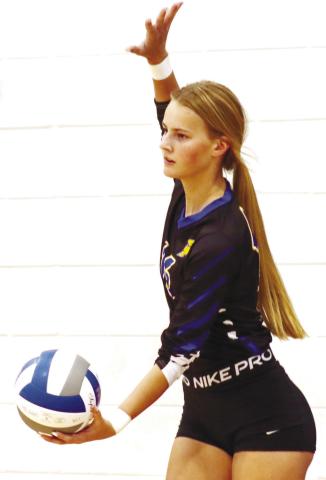 Junior Chloe Manville (15) sets up to serve a ball against the Washington-Wilkes Tigers earlier this month. LANCE McCURLEY/Staff