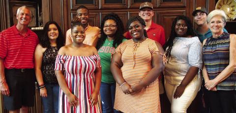 Greg and Anna Lawton with ATLAS scholarship recipients, honoring Greg’s legacy of mentorship, faith, and investment in Greene County students. CONTRIBUTED