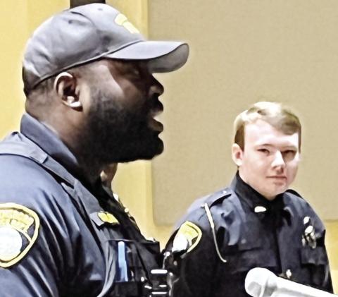 New Greensboro police officers, Marcus Callaway (left) and Carter Cadwiellader (right), introduce themselves to city council. MARK ENGEL/Staff