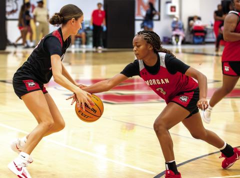 Morgan County’s Addisyn Freeman (3) guards Whitley Crumbley during a recent scrimmage. SKYLA MORRIS/Staff