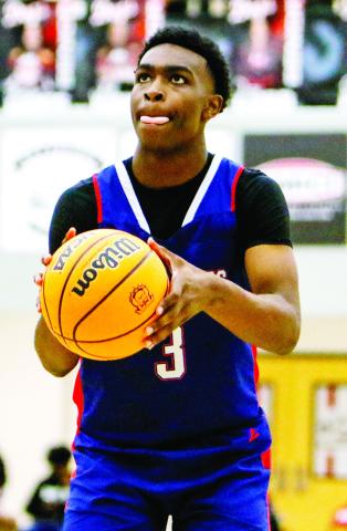 Junior Jmari Greene scored 19 points in a win over Greene County on Nov. 29. LANCE McCURLEY/Staff