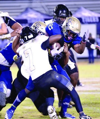 Greene County sophomore Dicorion Alexander (7) attempts to bring down an Early County ball carrier. COURTESY OF KATHRYN LANGLEY