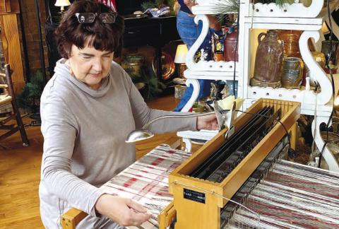 Popular weaver Cheryl White was featured at Genuine Georgia downtown. MAUREEN STRATTON/Staff