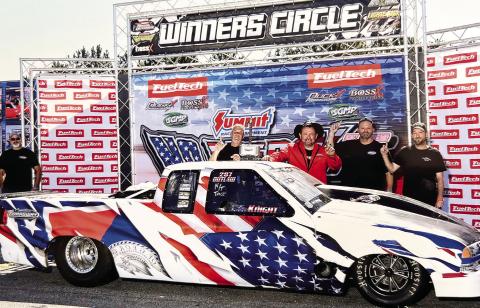 Eatonton-based racer C.G. Knight (center with hat) celebrates his No Mercy 15 win at South Georgia Motorsports Park with crewmembers Doug Colbert (left), Jason Mote, and Richard Disher. CHRIS SIMMONS/Contributed