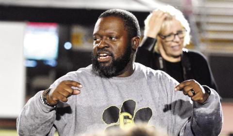 Greene County head coach Terrance Banks talks with his team after a win over Lincoln County last season. (LANCE MCCURLEY/Staff)