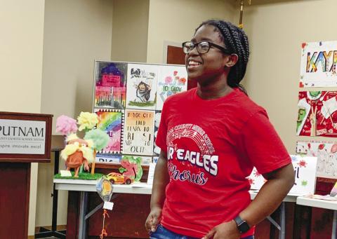 Sixth grader Kenzie Nelson sings an impromptu chorus short from “In My Own Little Corner” from Rodgers and Hammerstein’s Cinderella.