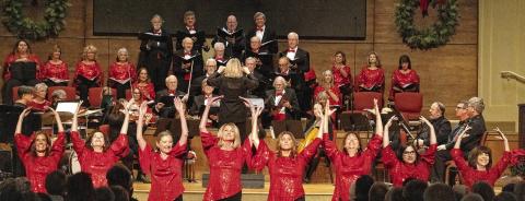 The ladies of the chorus perform a dance choreographed by Maureen Brower and Charlotte Mosteller during “A Tinseltown Christmas.” LEIGH LOFGREN/Staff