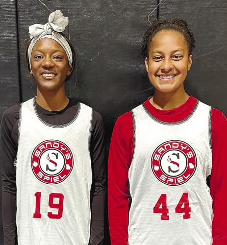 Kymora Smith (left) and Jaden Young (right) participated in a Sandy’s Spiel basketball camp this summer to further develop their skills. CONTRIBUTED
