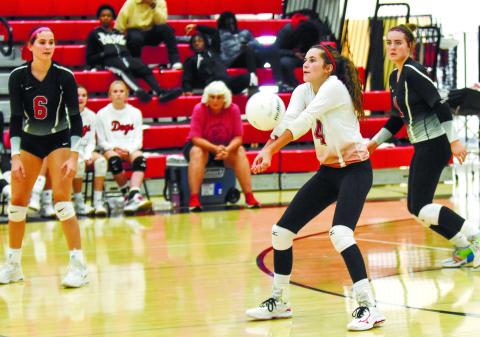 Spike Dog sophomore Camryn Scherer (4) returns a Thomasville serve in the second set of last Wednesday’s match. LANCE McCURLEY/Staff