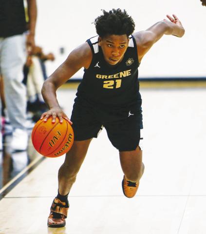 Greene County head coach Mark Wright is excited about the future of the program with players like Qua Williams (21) returning next season. LANCE McCURLEY/Staff