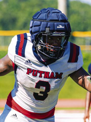 Putnam County defensive end Elijah Dunn (3) rushes the passer during the team’s padded camp in Eatonton on July 16. JCVISUALS/Contributed