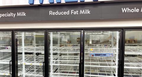 The milk shelves at Walmart in Madison were bare after victims of Hurricane Helene to the east traveled west to search for supplies. T. MICHAEL STONE/Staff