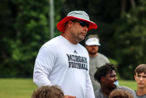 Clint Jenkins talks to his players following the first day of Morgan County's padded camp. STAFF/Lance McCurley