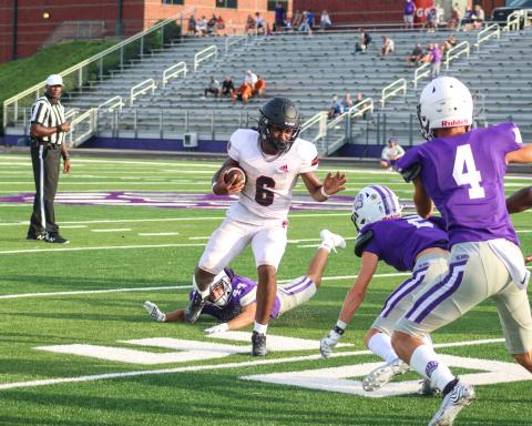Morgan running back DJ Smith (6) tries to avoid a Cherokee Bluff defender. LANCE MCCURLEY/Staff