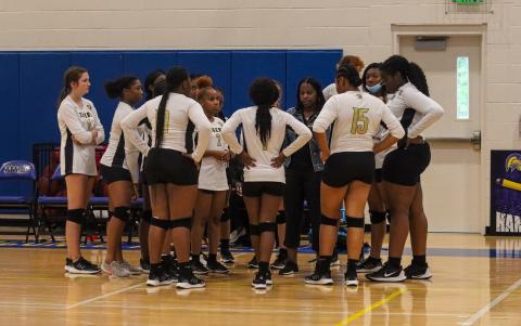 The Lady Tigers huddle during a timeout against Lake Oconee Academy. LANCE McCURLEY/Staff
