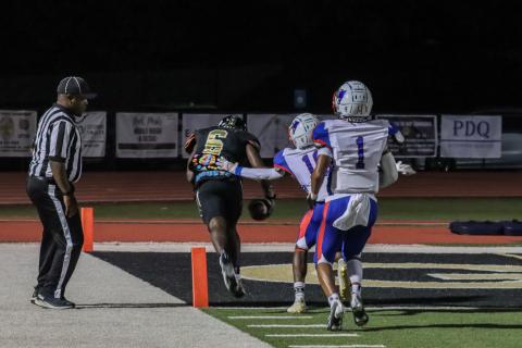 Greene County wide receiver Javaris Harris (6) tip-toes in the end zone for a touchdown. LANCE McCURLEY/Staff