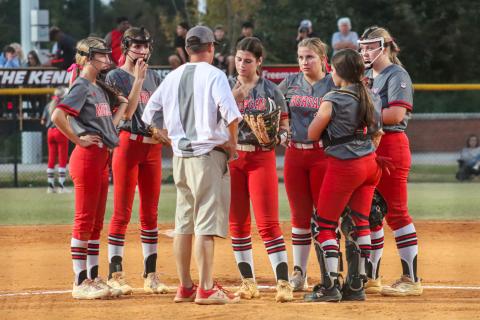 Morgan County head coach Doug Connelly (center) meets with the team during a stoppage of play against Prince Avenue last week. LANCE MCCURLEY/Staff