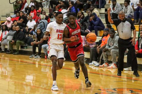 Thompson (26) drives the lane past a Cedar Shoals' guard. LANCE MCCURLEY/Staff