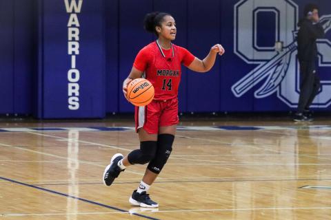 Lady Dogs' sophomore Jaden Young (14) brings the ball up the court against Oconee County. LANCE MCCURLEY/Staff