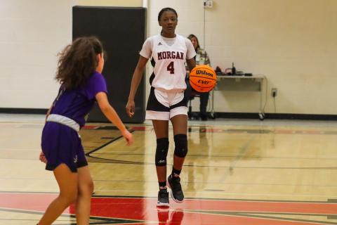 Morgan County sophomore guard Kymora Smith (4) brings the ball up the court during a win over ARC earlier this month. LANCE MCCURLEY/File Photo
