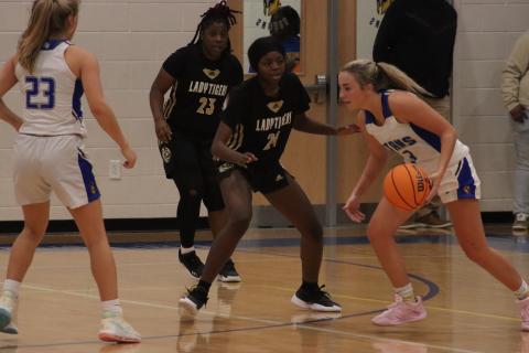 Greene County's Keiara Jernigan (24) defends Lake Oconee Academy guard Georgia Bosart (3) in a loss on Friday, Jan. 6. BRENDAN KOERNER/Staff