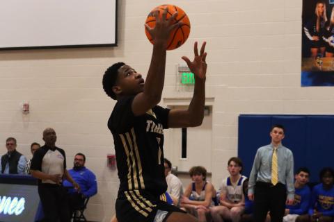 Greene County sophomore Steve Miller (1) goes up for a layup against LOA in a 47-37 road win over the Titans on Jan. 6. BRENDAN KOERNER/Staff