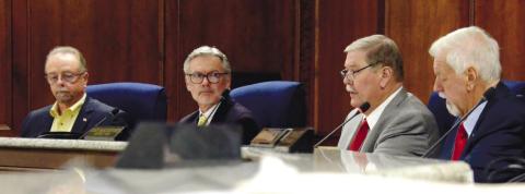 L-R: Putnam County Commissioners Alan Foster, Daniel Brown, Gary McElhenney and Board Chairman Bill Sharp listened for approximately two hours as citizens expressed opinions on short-term rentals last Thursday night. IAN TOCHER/Staff