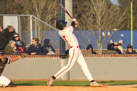 Bulldog freshman Drew Ainslie (7) slaps a line drive into right field in a loss to Apalachee last week. LANCE MCCURLEY/Staff