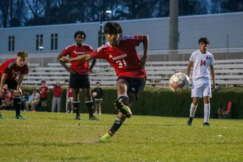 Julian Tenorio (31) takes a shot on goal last year during a win over ARC. LANCE McCURLEY/Staff